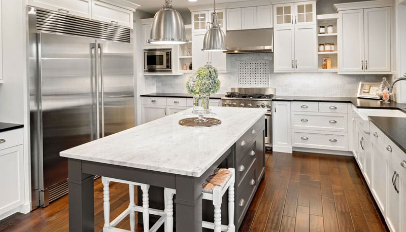 modern kitchen with new white and gray cabinets