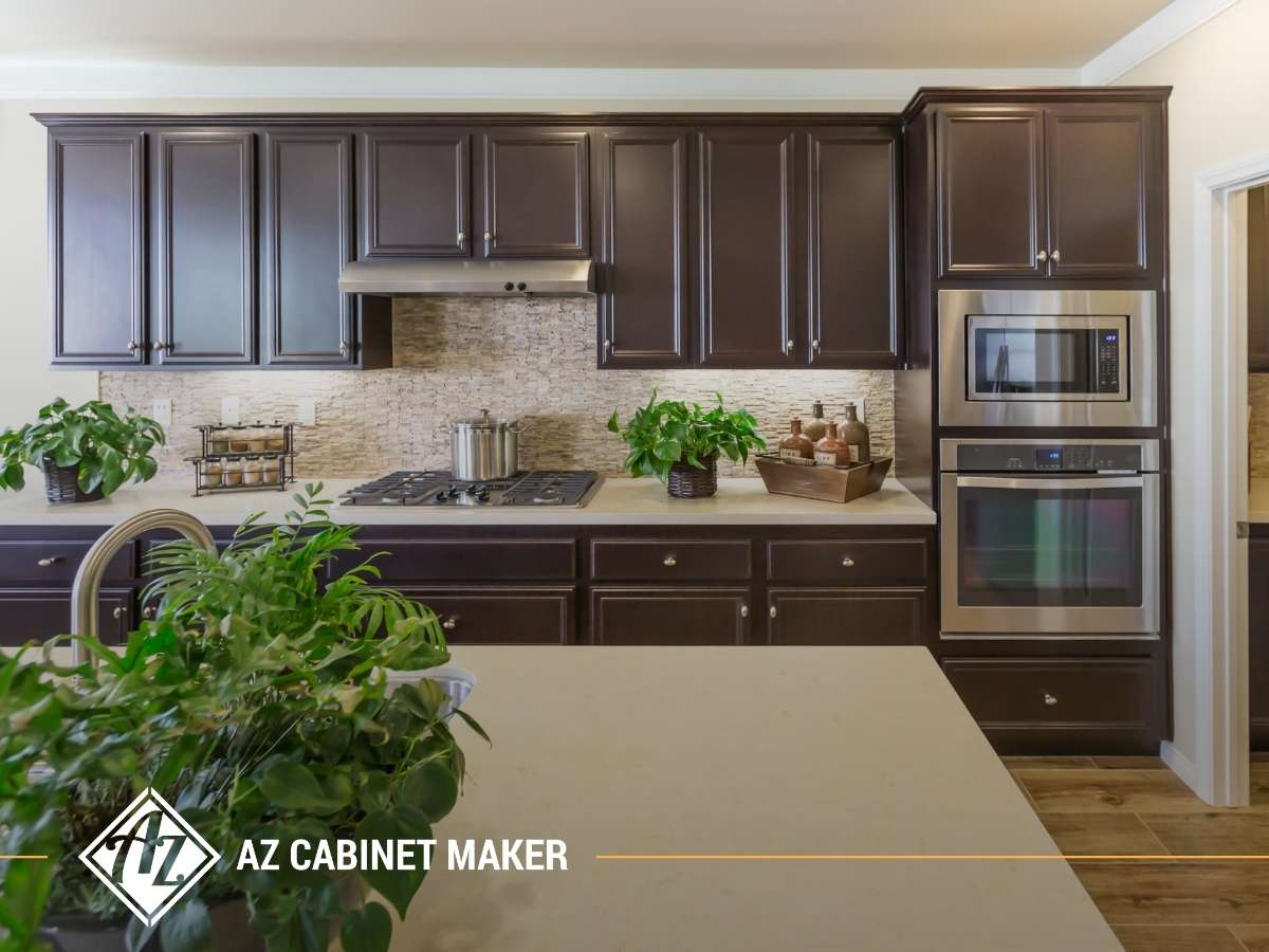 Efficient Arizona kitchen with dark cabinets and sleek appliances, designed for maximum storage