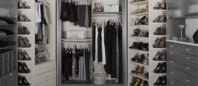 custom-walk-in-closet-cabinetry-with-organized-shelving-and-drawers Custom walk-in closet cabinetry with organized shelving and drawers